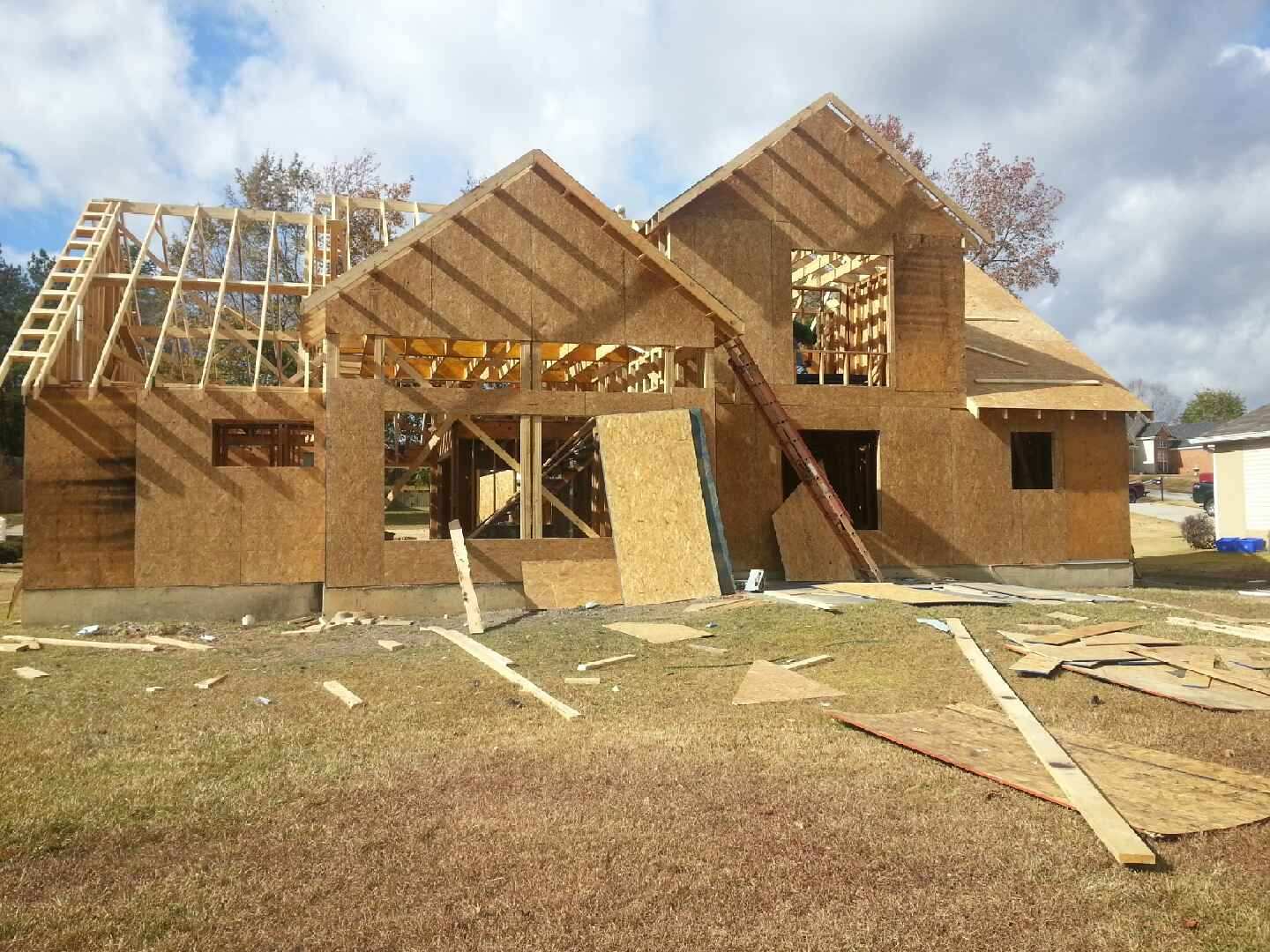 exterior of house being framed blount's complete home services fire water restoration termite pest control augusta ga