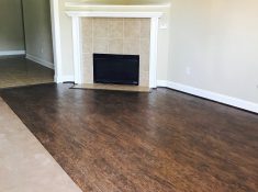 living room with hardwoods and carpet and fire place new home build Augusta blount's complete home services fire water restoration termite pest control augusta ga